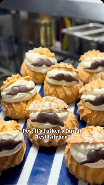 Choux buns with chocolate moustaches